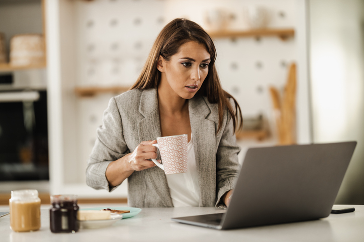 A woman looking up how the IRS defines imputed interest for gift loans.