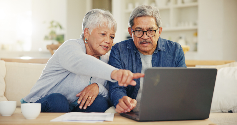 A senior couple looking at different accumulation strategies.