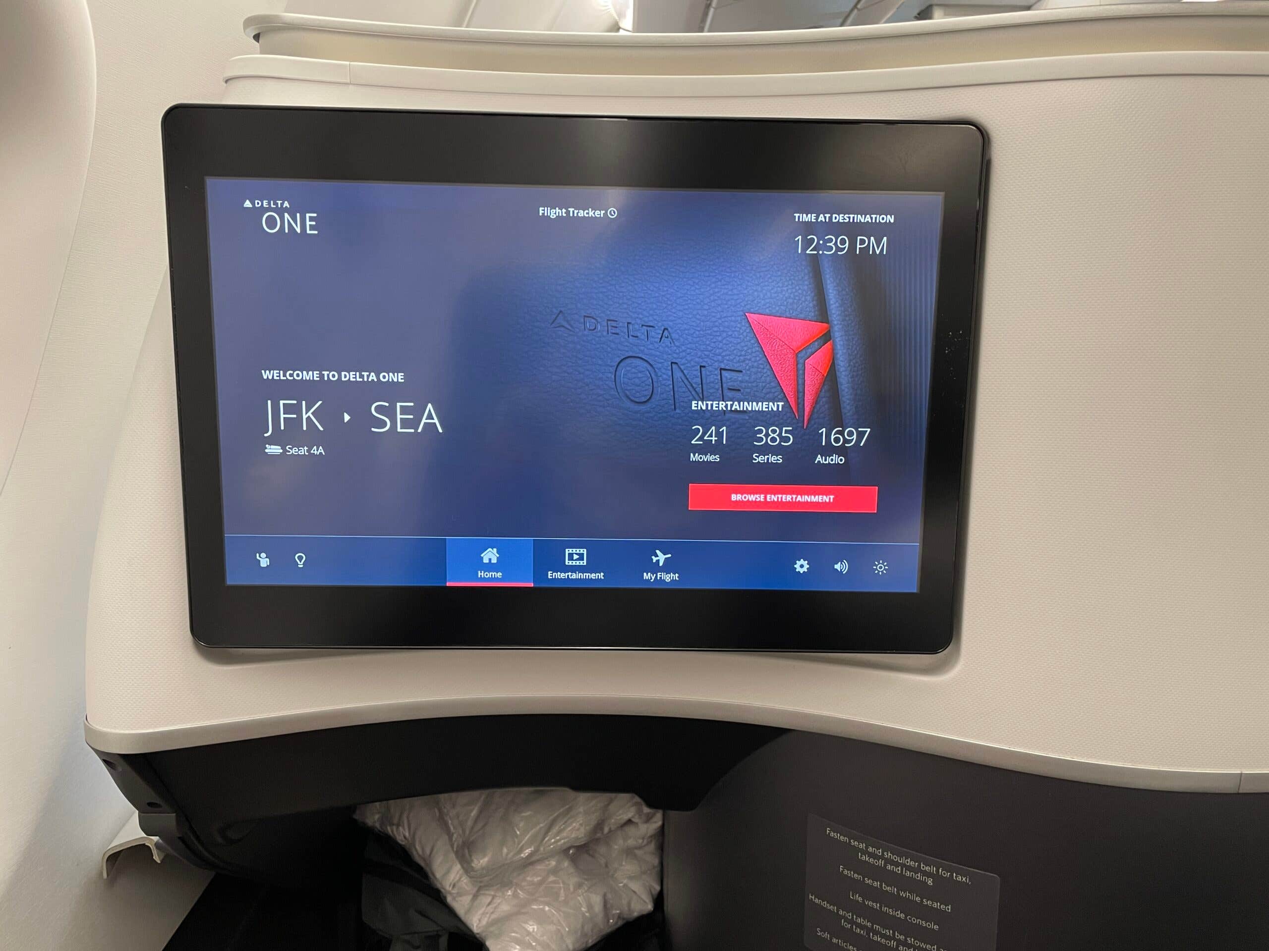 The entertainment screen in a Delta One suites aircraft