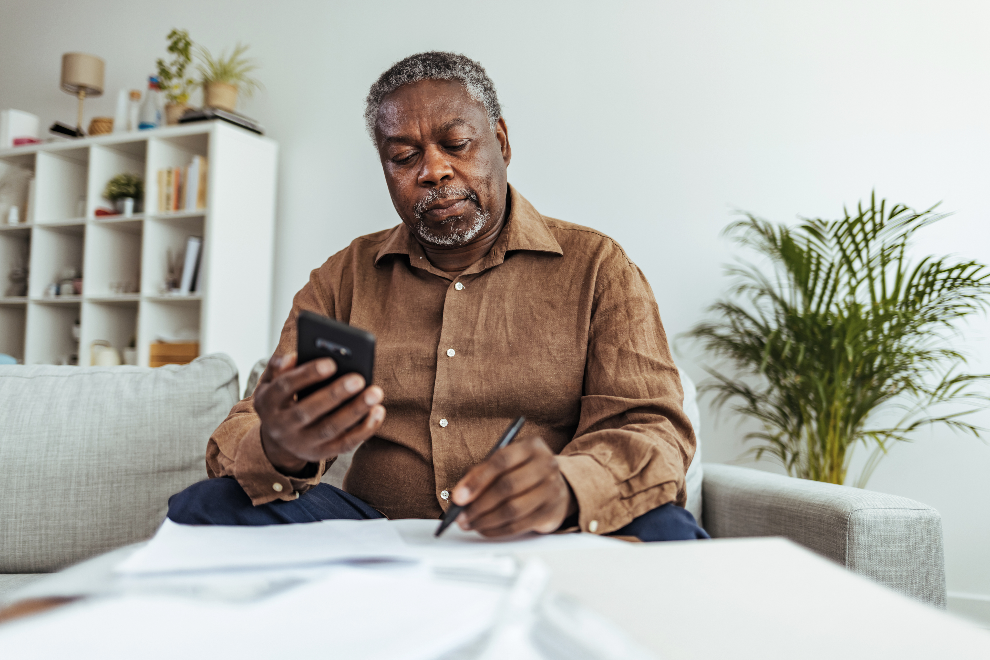 A senior calculating his Social Security benefits.