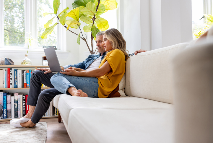 A couple designating beneficiaries to their retirement plans.