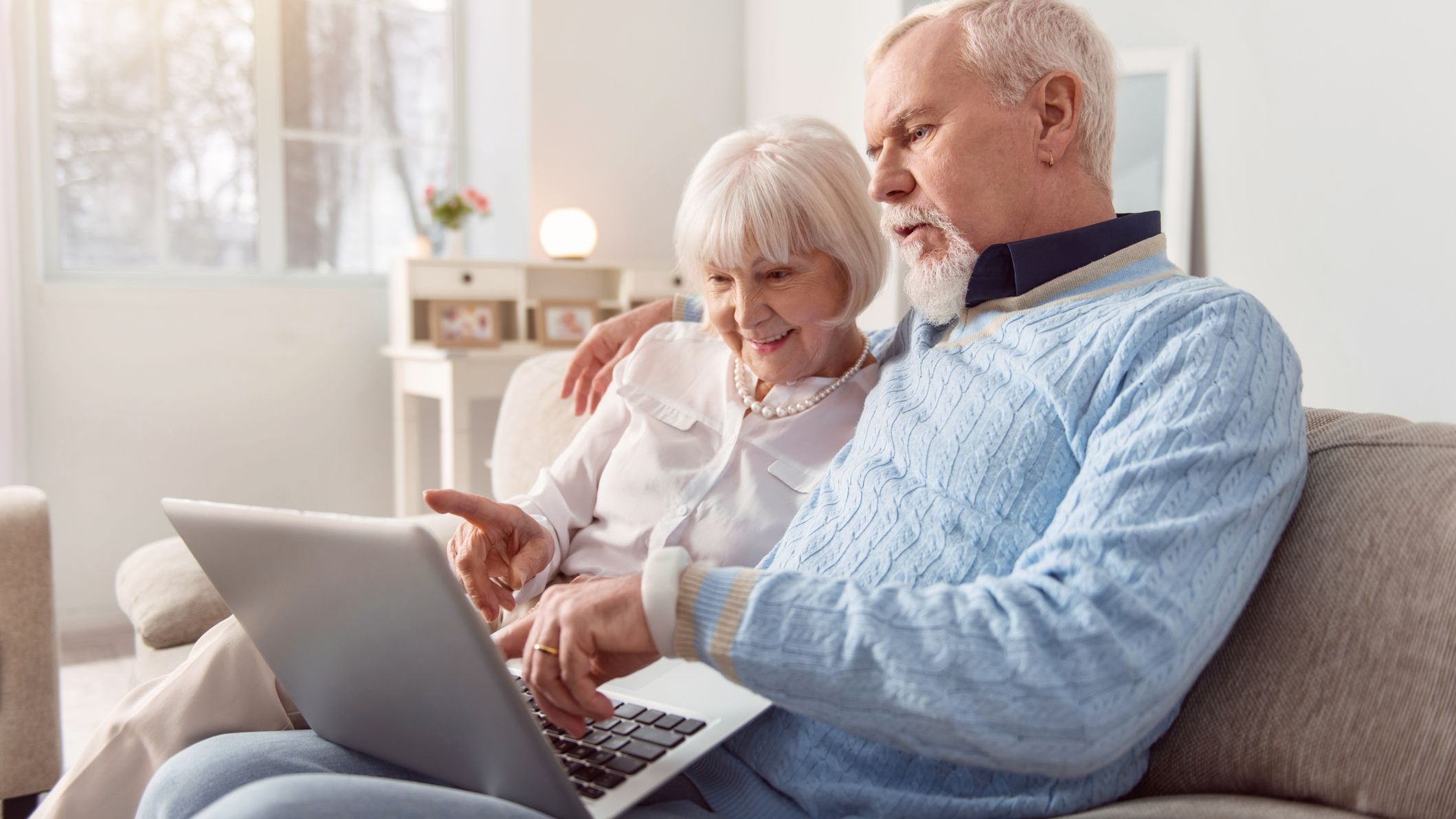 A retired couple looks over their new Social Security benefits following the most recent COLA.