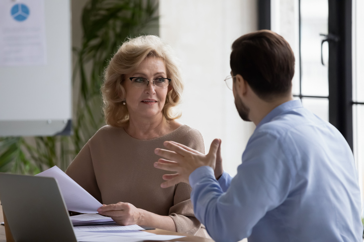 A financial advisor reviewing a retirement plan with a client.