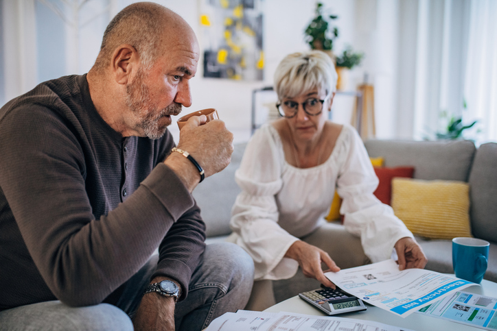 A senior couple discussing their retirement plans.