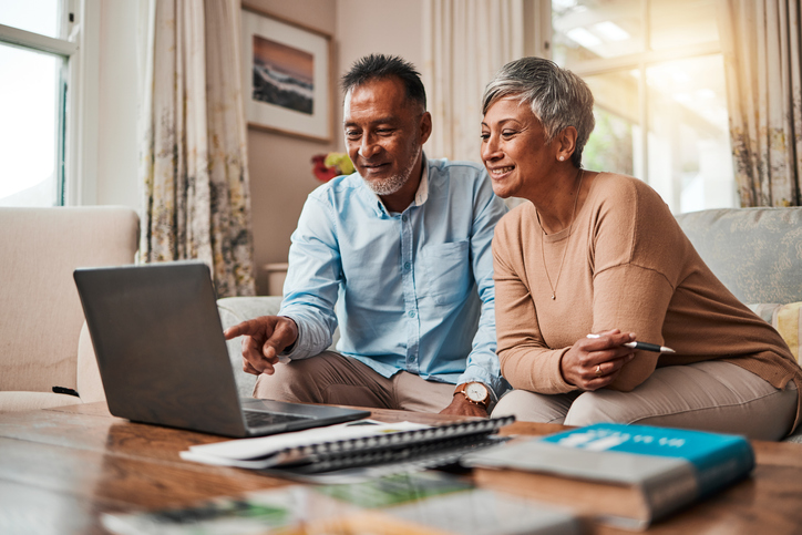 Setting aside cash or money in a taxable brokerage account before retiring could help cover health insurance costs without increasing distributions from your retirement accounts.